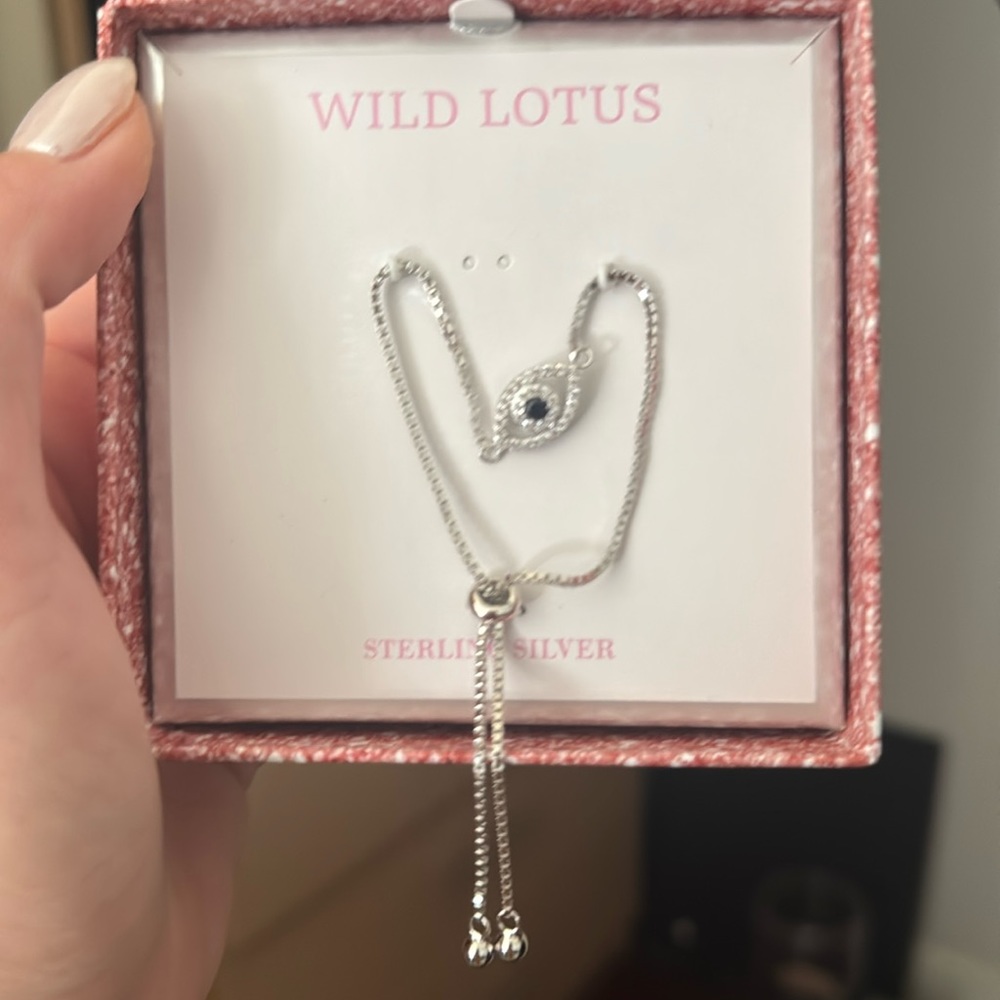 Silver evil eye adjustable bracelet